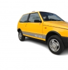 EMBLEMA FAIXA LATERAL FIAT UNO 1984 ATÉ 1989 1.5R AMARELO